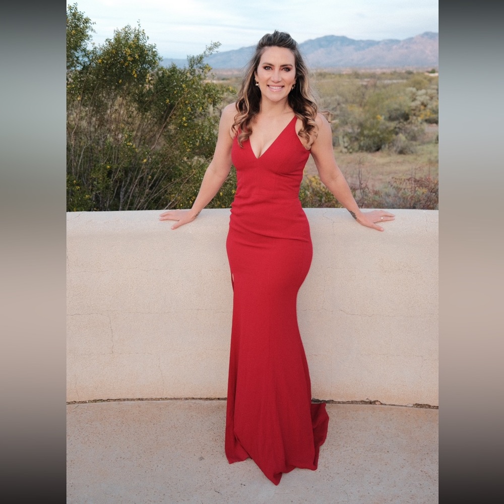 Red dress from dress the population. Size medium.